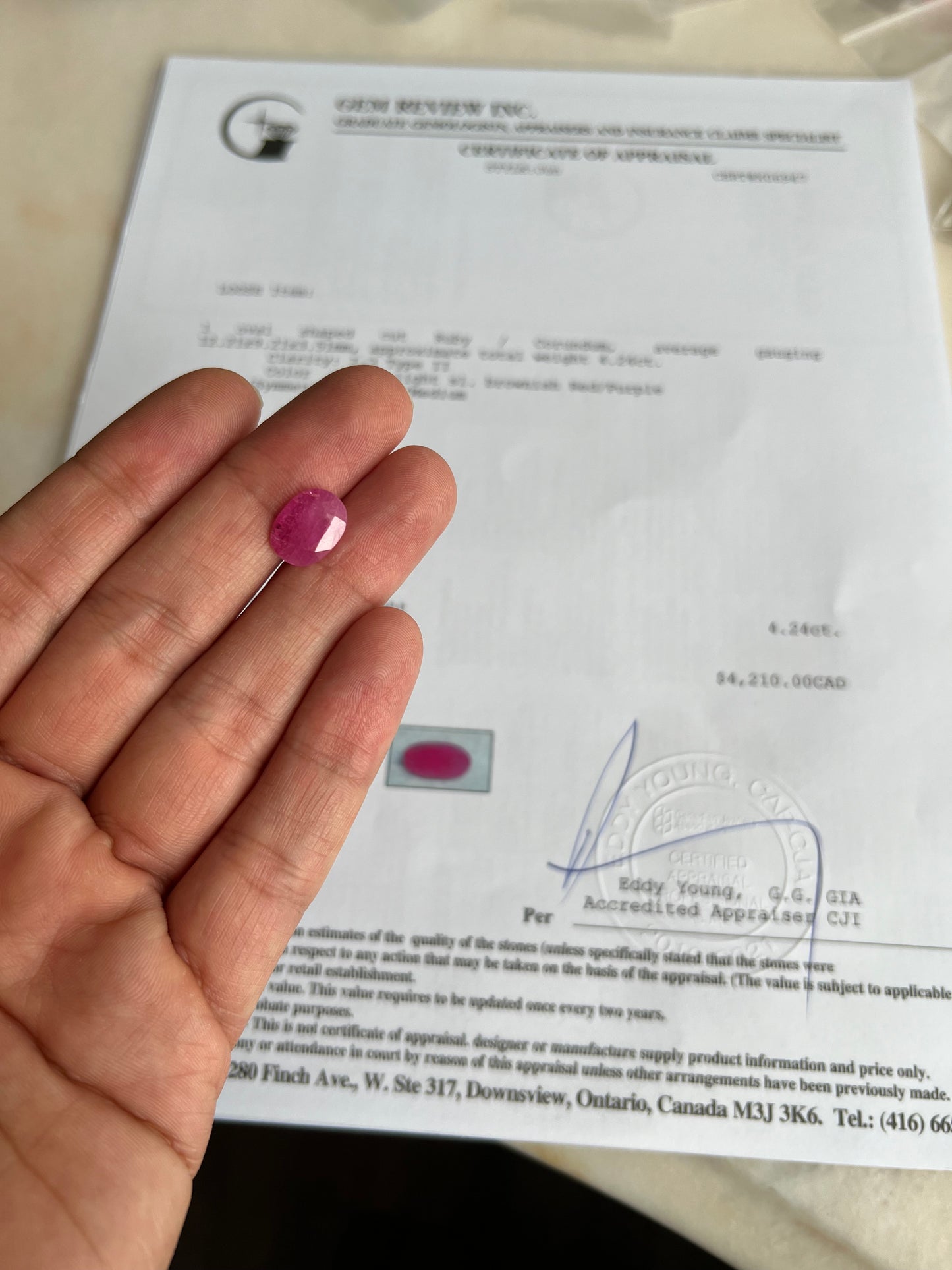 Natural Ruby 4.24 carats oval - certified appraisal report