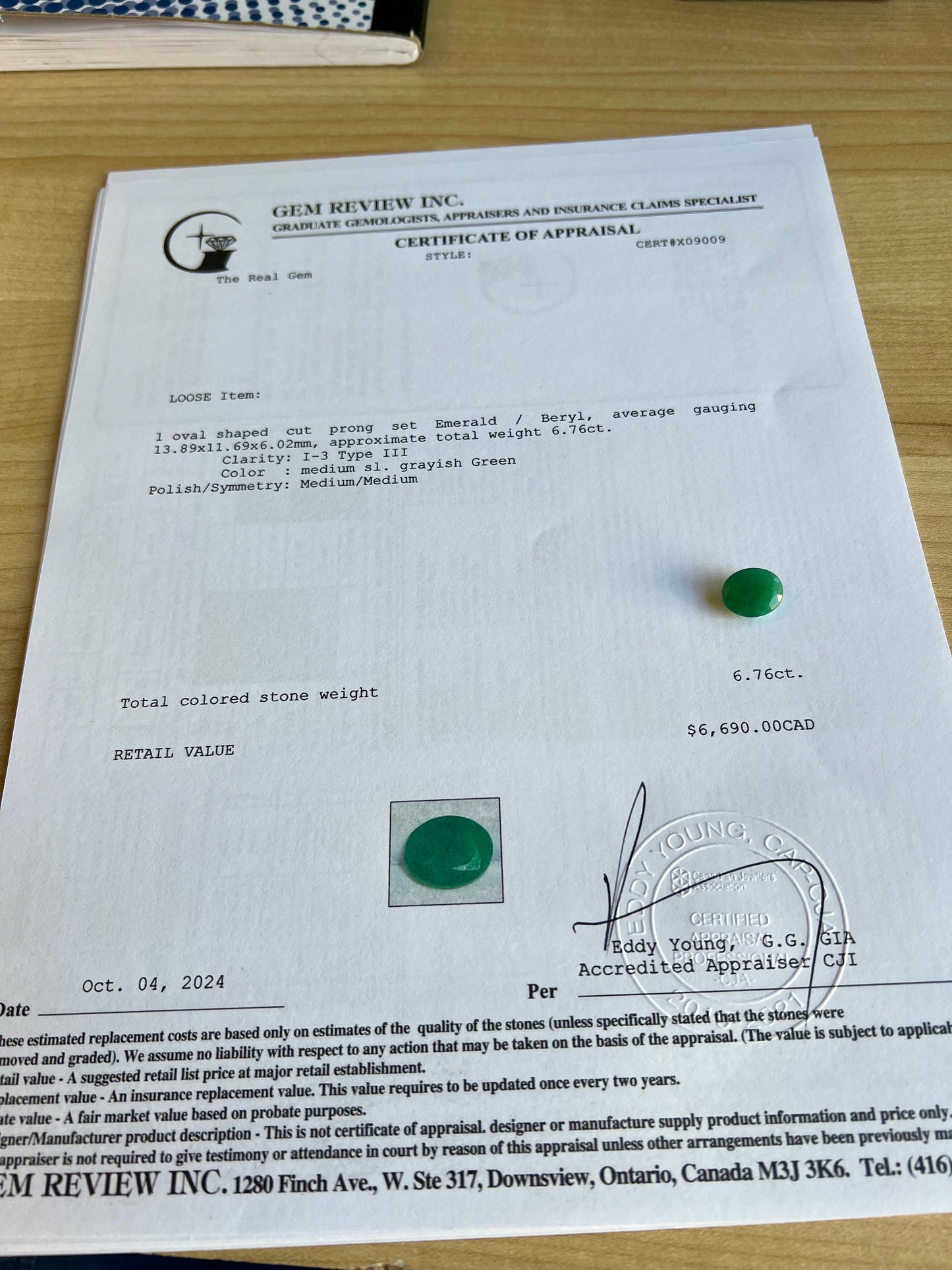 6.76 carats natural Zambian emerald oval cut